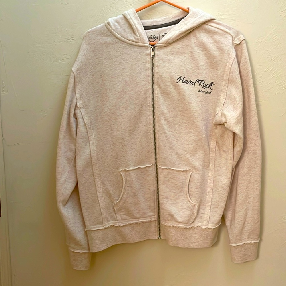 Cream colored women’s hooded sweatshirt, Hard Rock New York